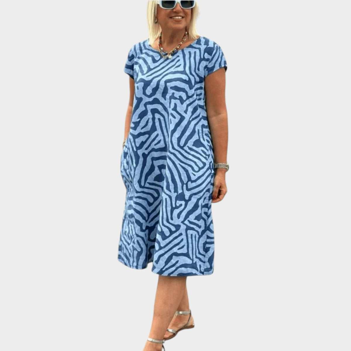 Women’s Abstract Print Midi Dress with Round Neck and Side Pockets